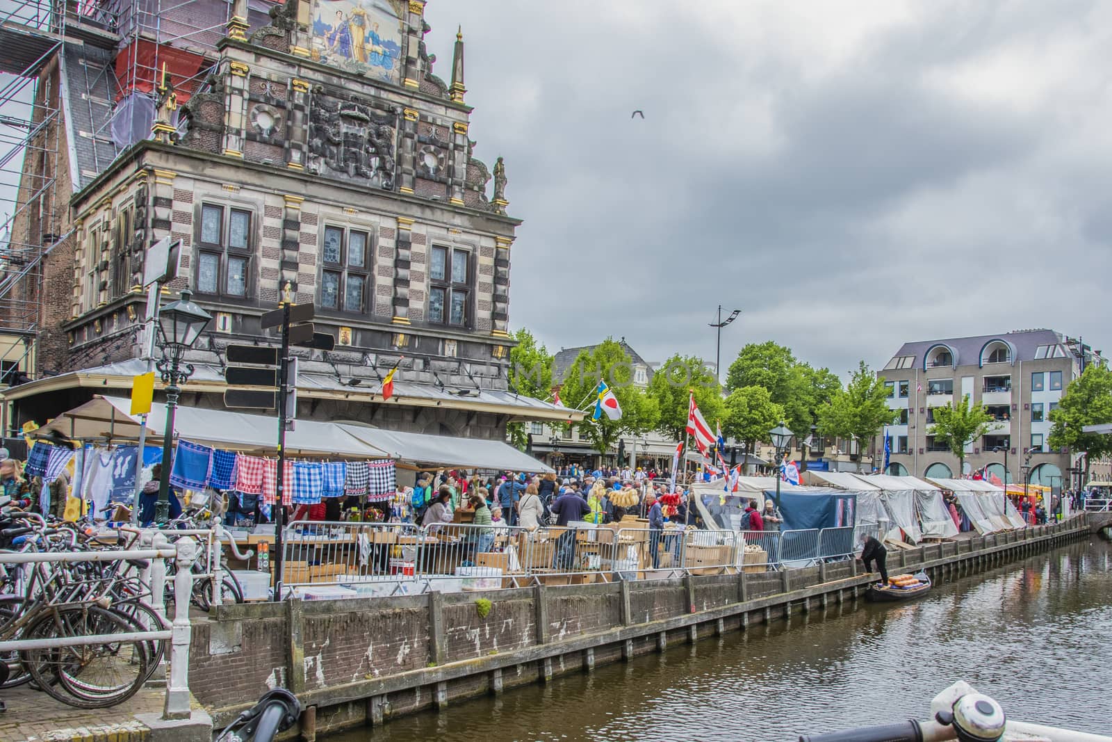 view of the alkmaar market where the historic cheese weighing building stands out. netherlands holland