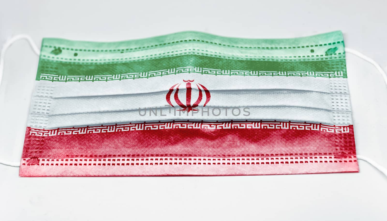 surgical mask with the national flag of Iran printed. Pandemic covid-19 and preventive measures to counter the spread of the virus