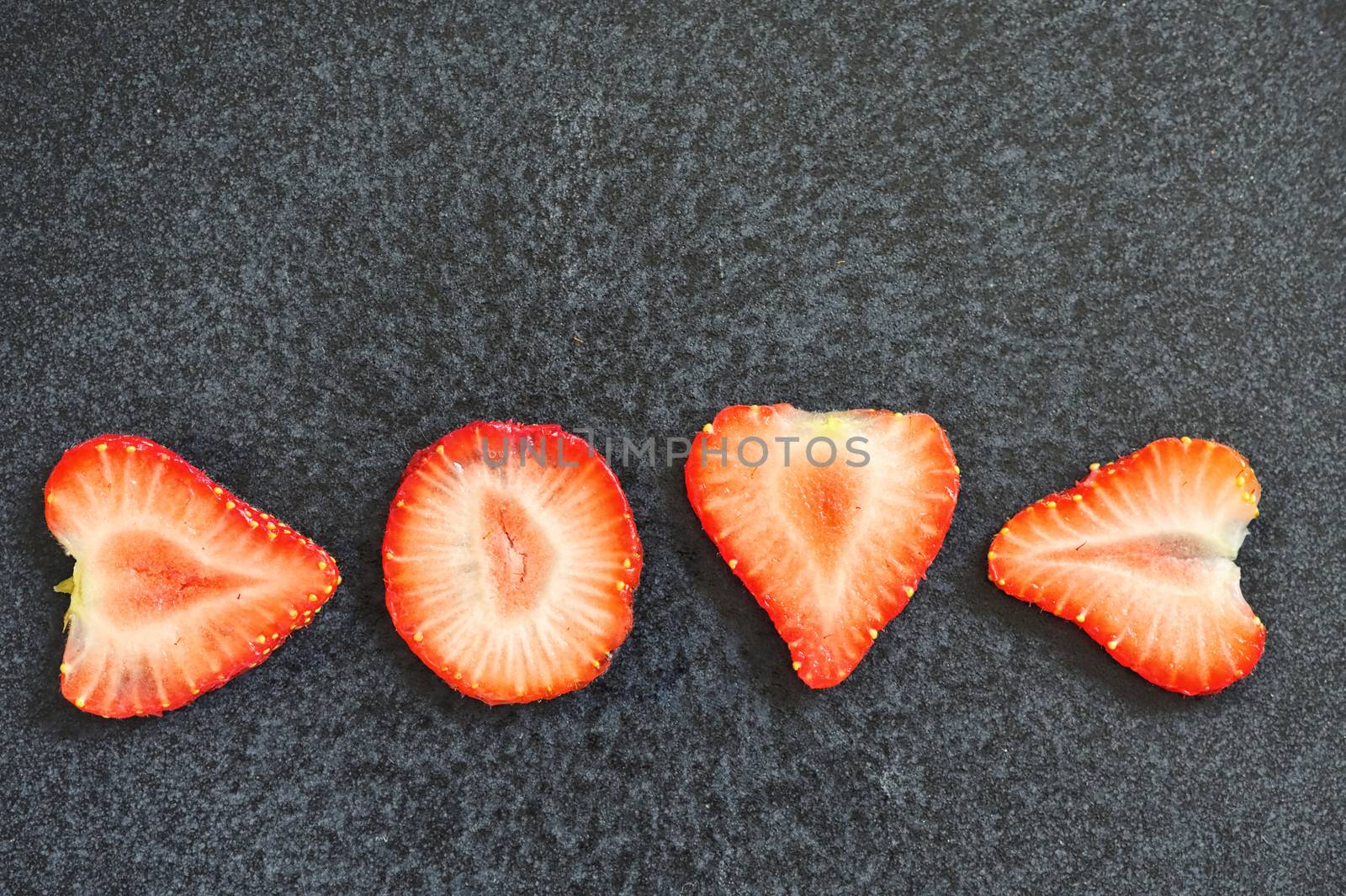 Love Letters Strawberry Slices Isolated On Black Background