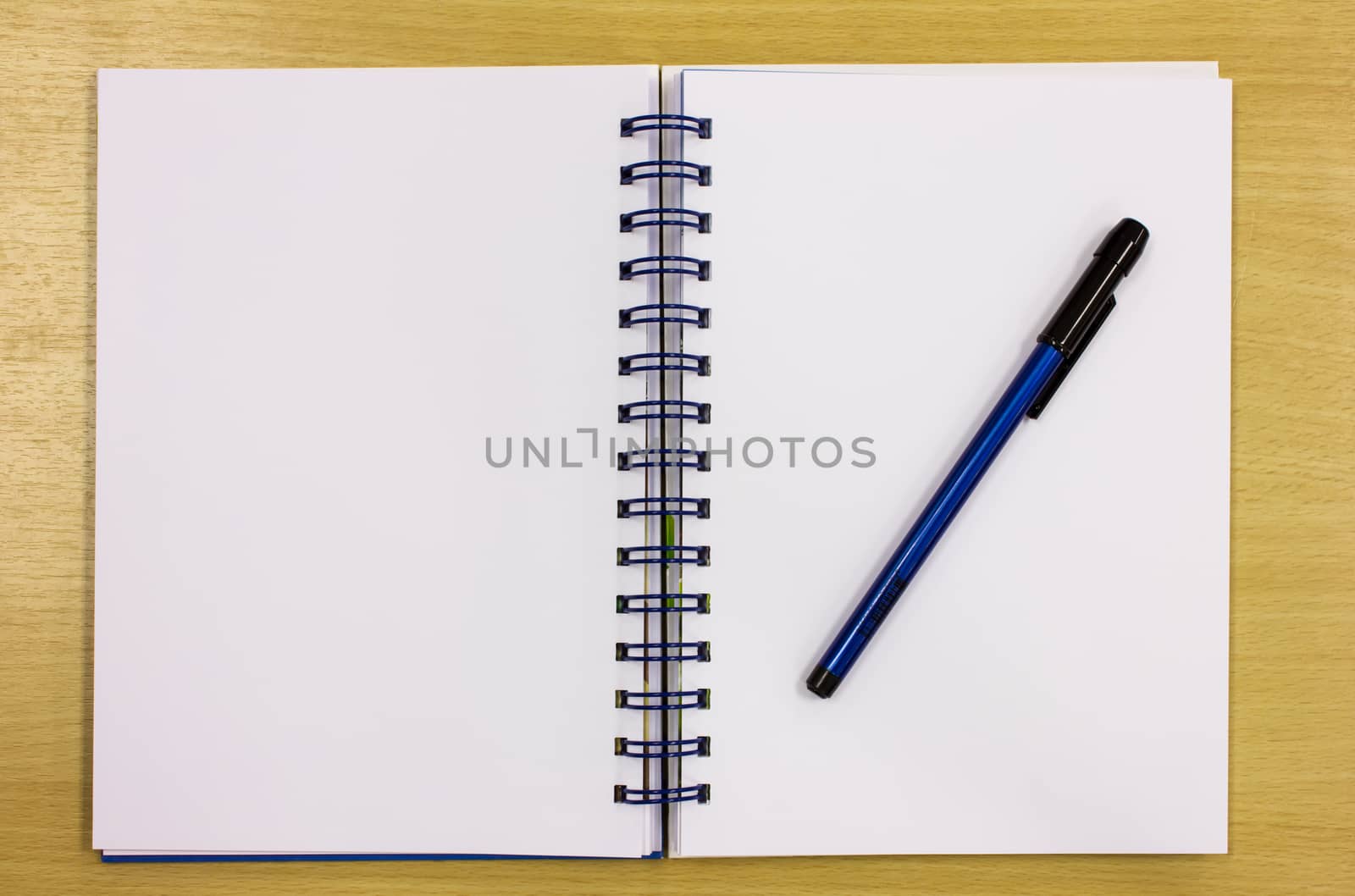 blue diary book on table office