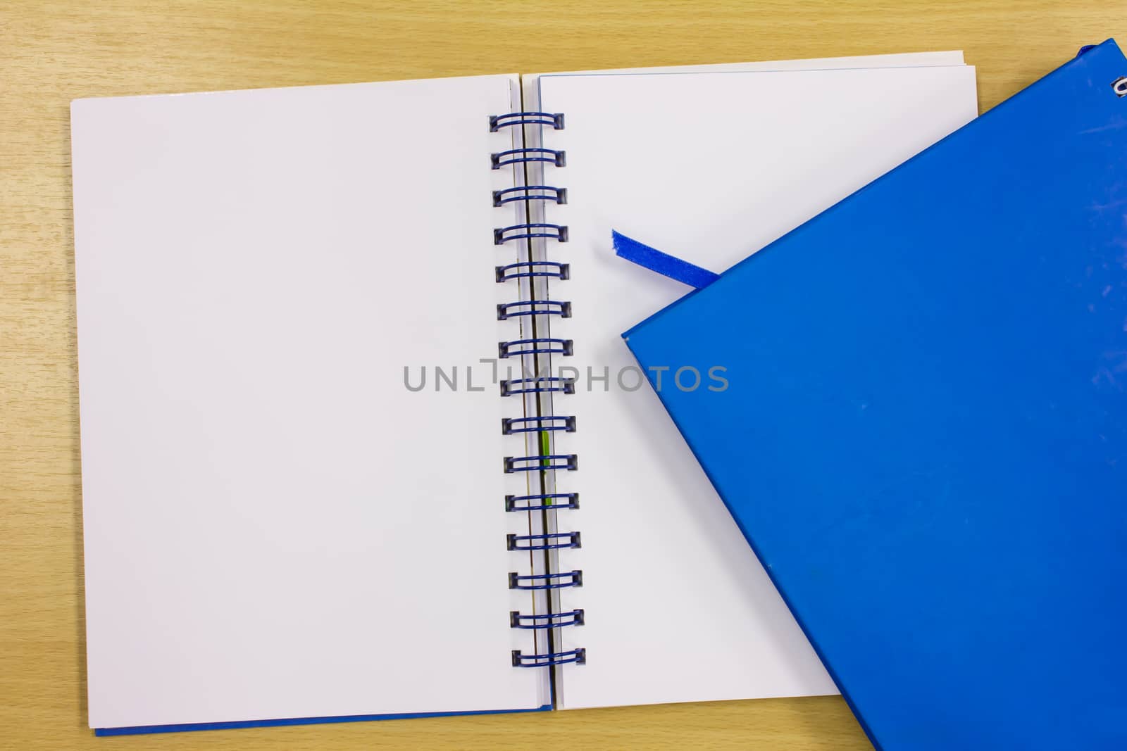 blue diary book on table office