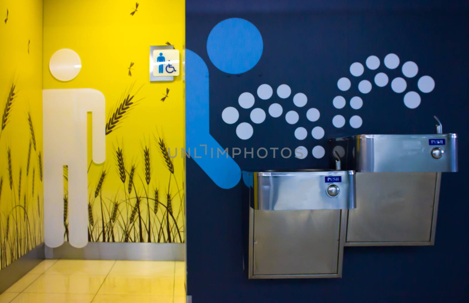 Washing hands in a public restroom and Public Drinking water