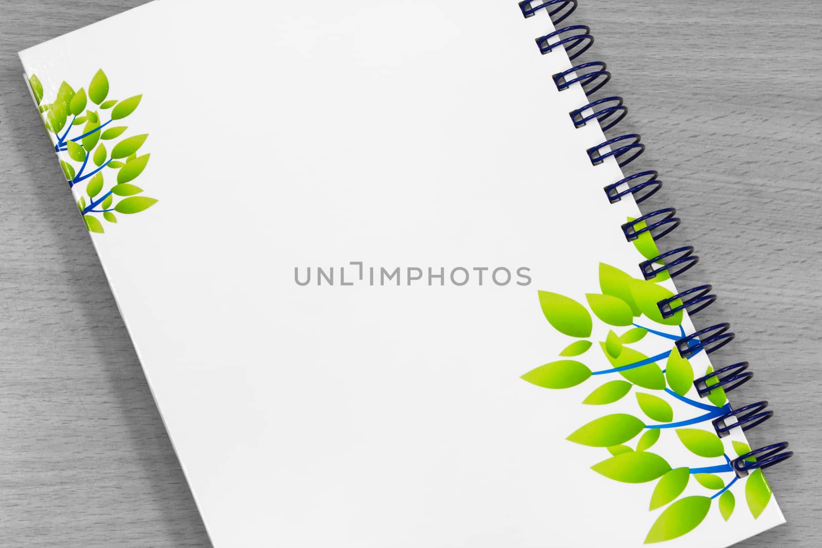 note book paper diary and work on wood table