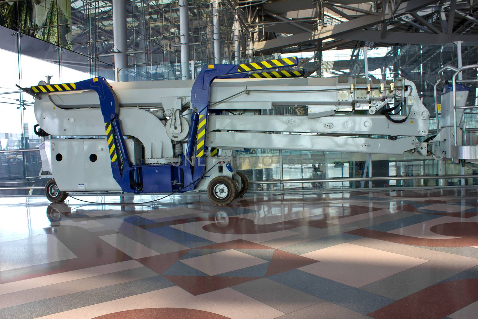 Blue elevator in airport building