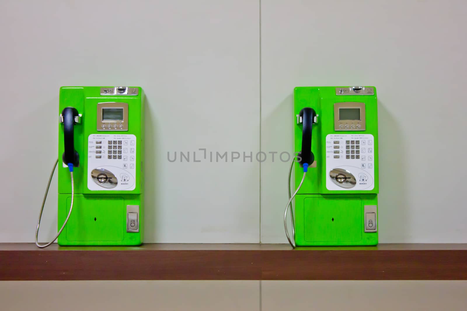 The roll of colorful public phones in the railway station