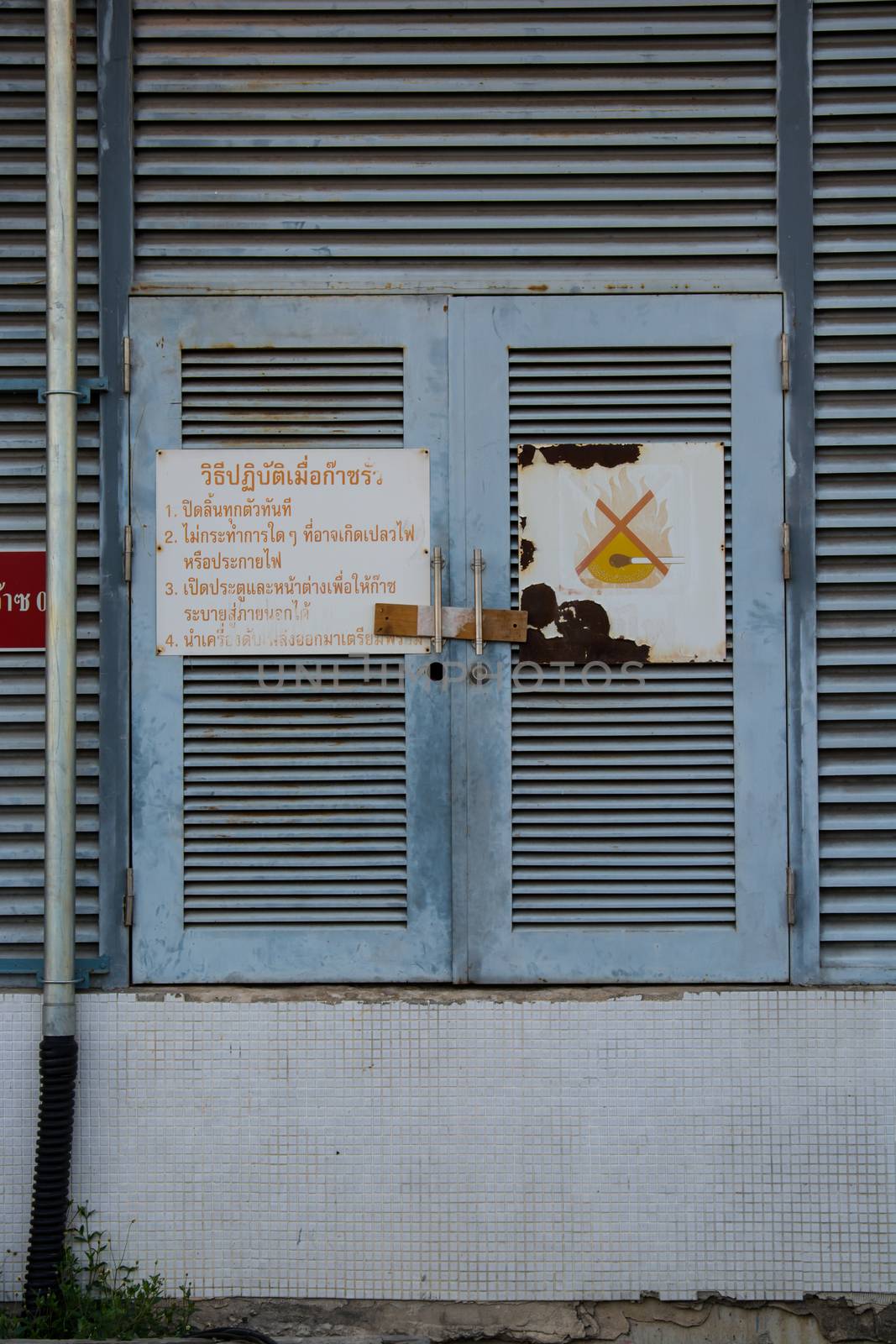warning signs on the old door