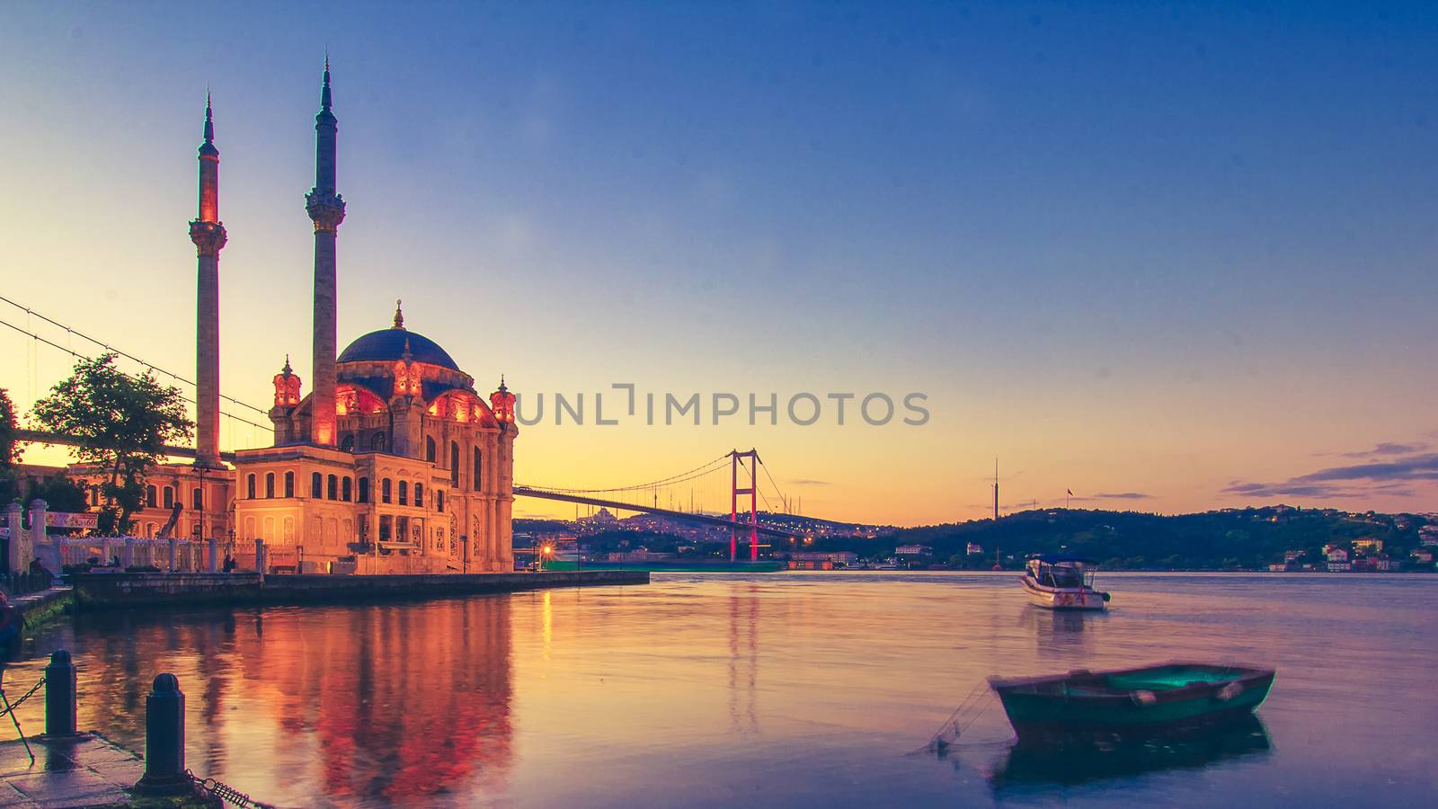 Ortakoy Istanbul panoramic landscape beautiful sunrise with clouds Ortakoy Mosque and Bosphorus Bridge, Istanbul Turkey. Best touristic destination of Istanbul. Romantic view of Istanbul city.