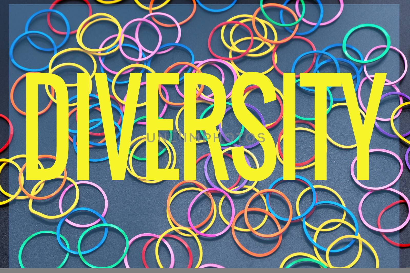 Diversity concept. mix colorful rubber band on black background with text Diversity