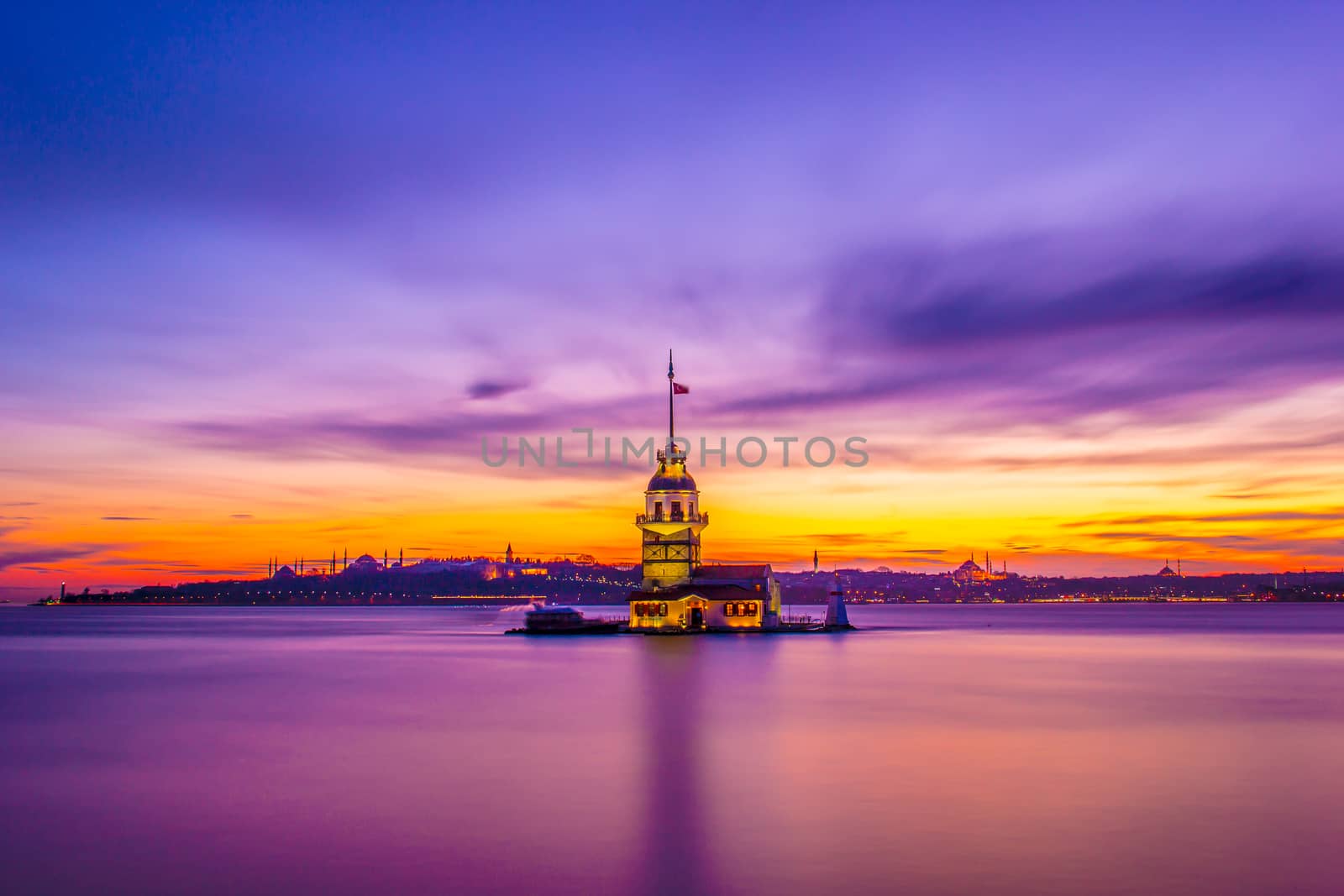 Maiden's tower in istanbul beautiful colorful sunset (Turkish:Kiz Kulesi) from Uskudar. Istanbul symbol. Romantic Istanbul Sunset Landscape. Istanbul Bosphorus and Maiden's Tower amazing view, Turkey