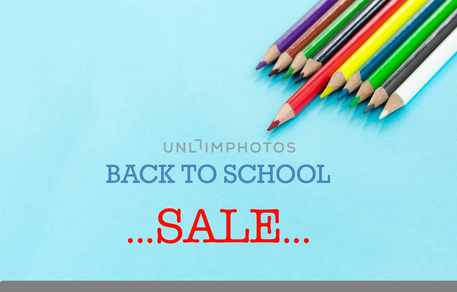 back to school Concept. Close up shot of color pencil pile pencil nibs on blue background
