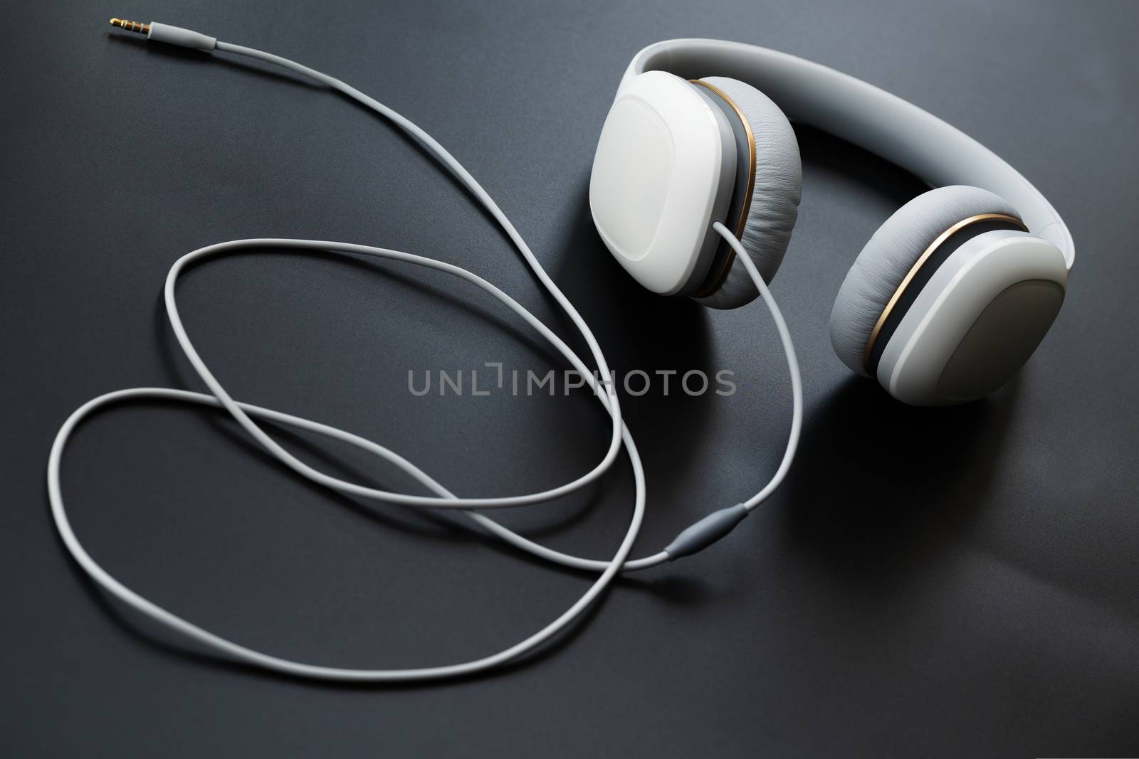 Headphones white isolated on a black background