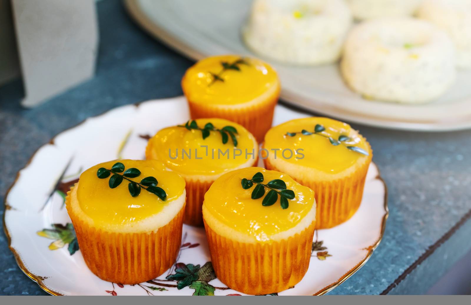 Lemon cupcakes with lemon green leave, group of bakery cupcake and other cake, selective focus