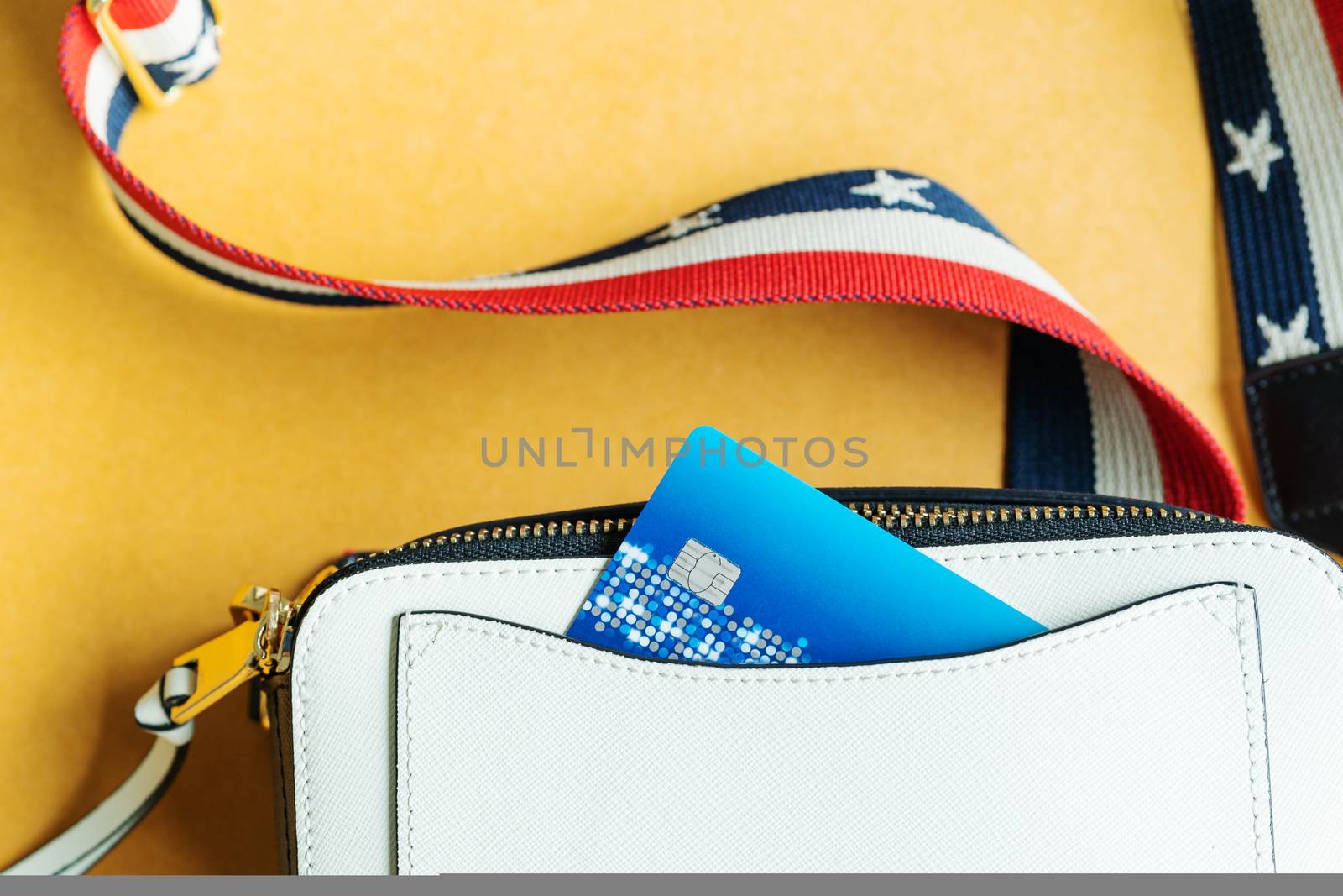 credit card in white shoulder bag, ready shopping concept