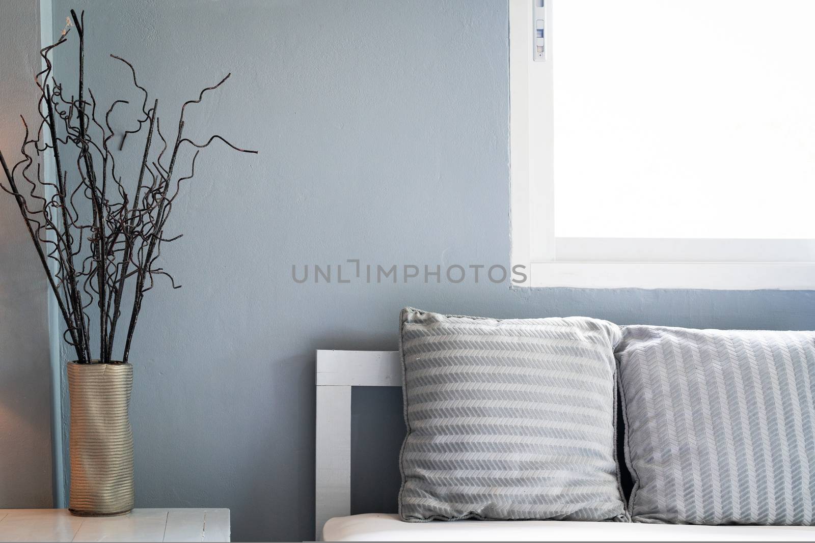 comfortable living room, grey pillow on sofa with window, copy space.