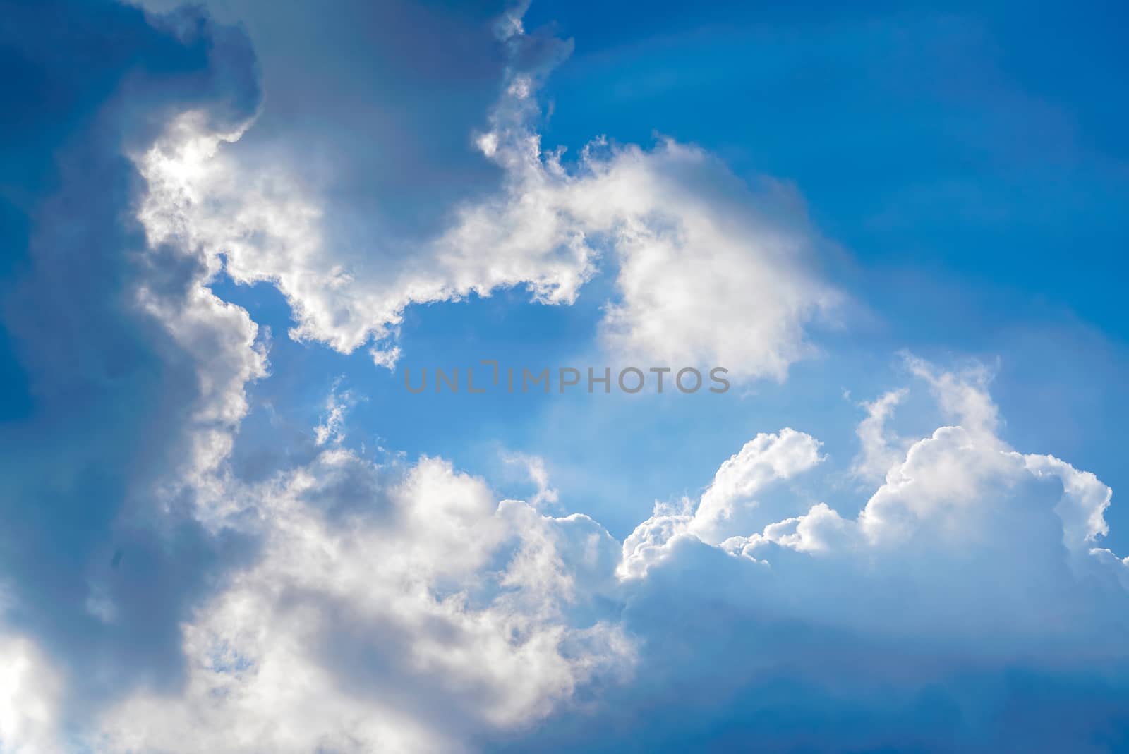  Sunbeams Light and Moody Cloudscape. Nature Background Concept by chadchai_k