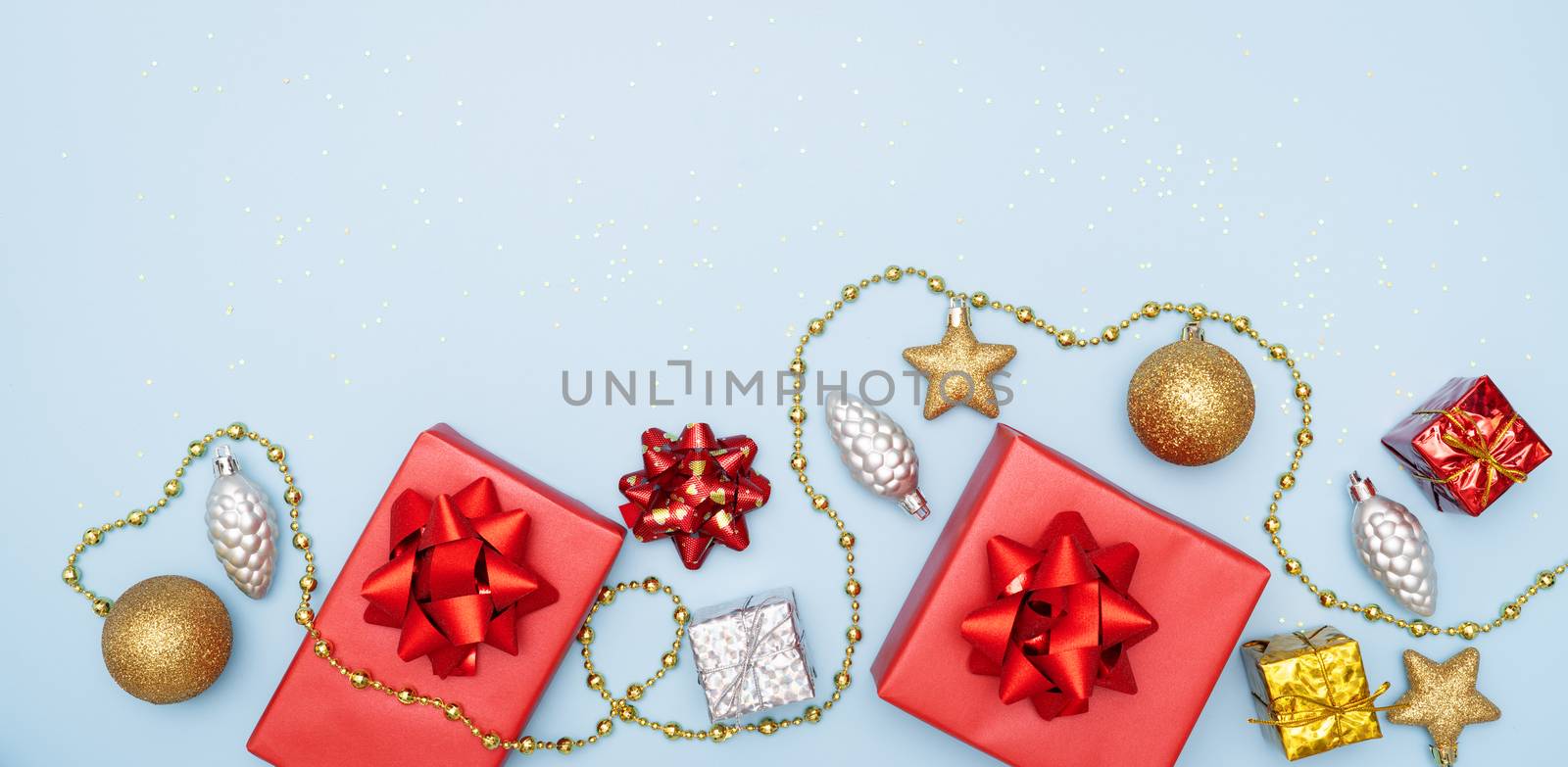 gifts boxes or presents boxes with red bows, star and ball on bl by psodaz