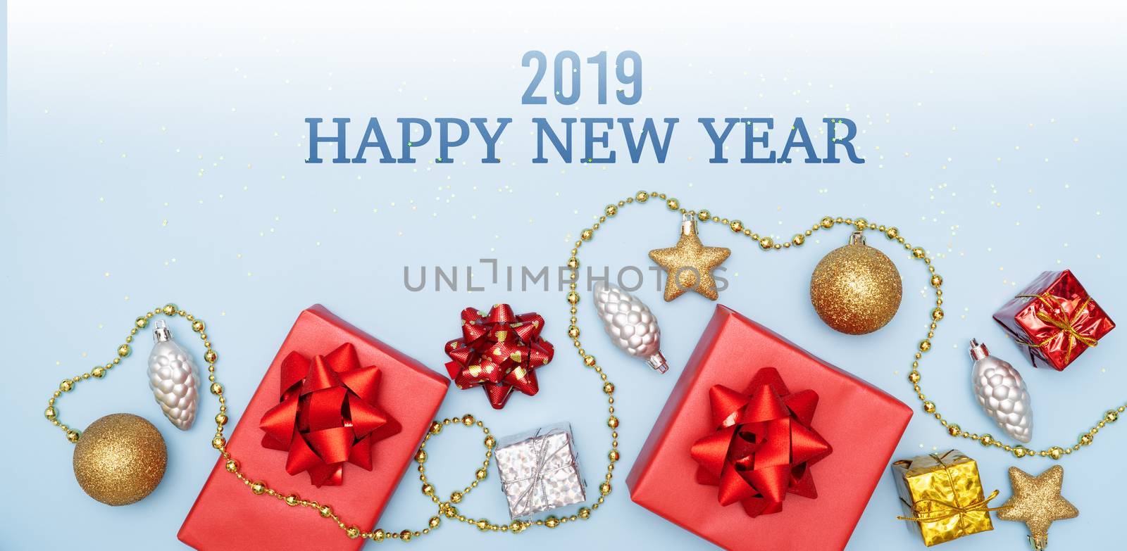 2019 Happy New Year concept, gifts boxes or presents boxes with red bows, star and ball on blue background