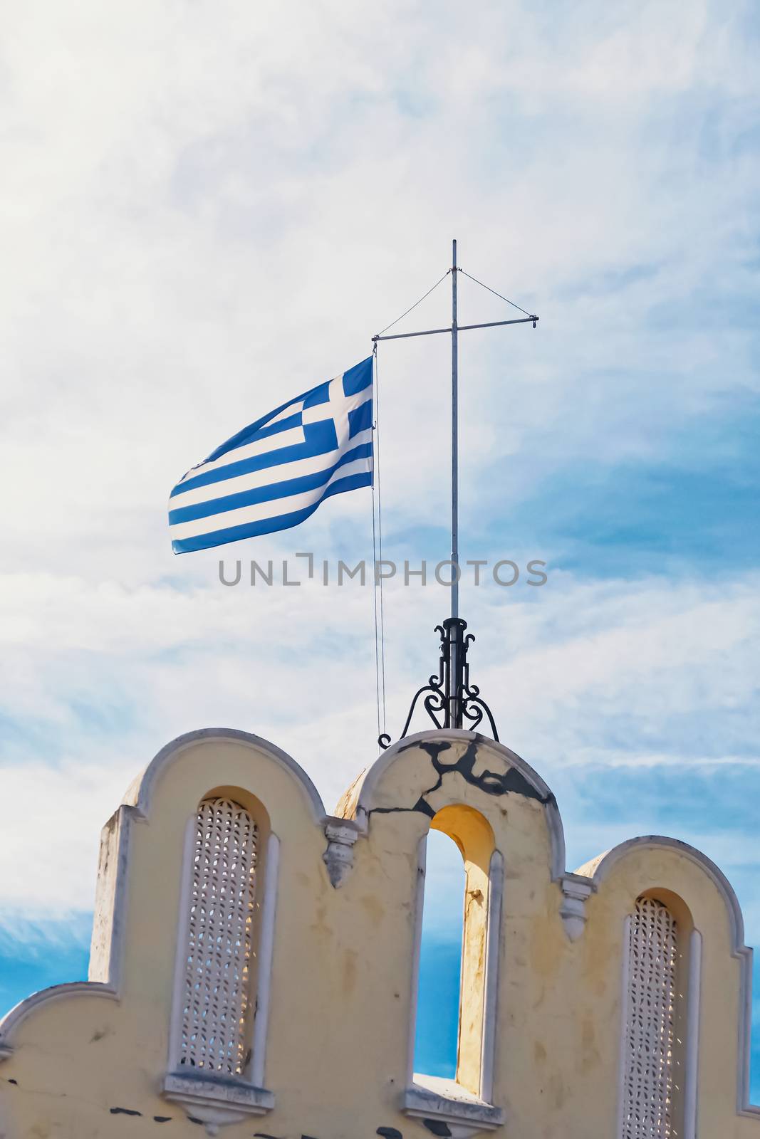 Greek flag and blue sky, travel and politics by Anneleven