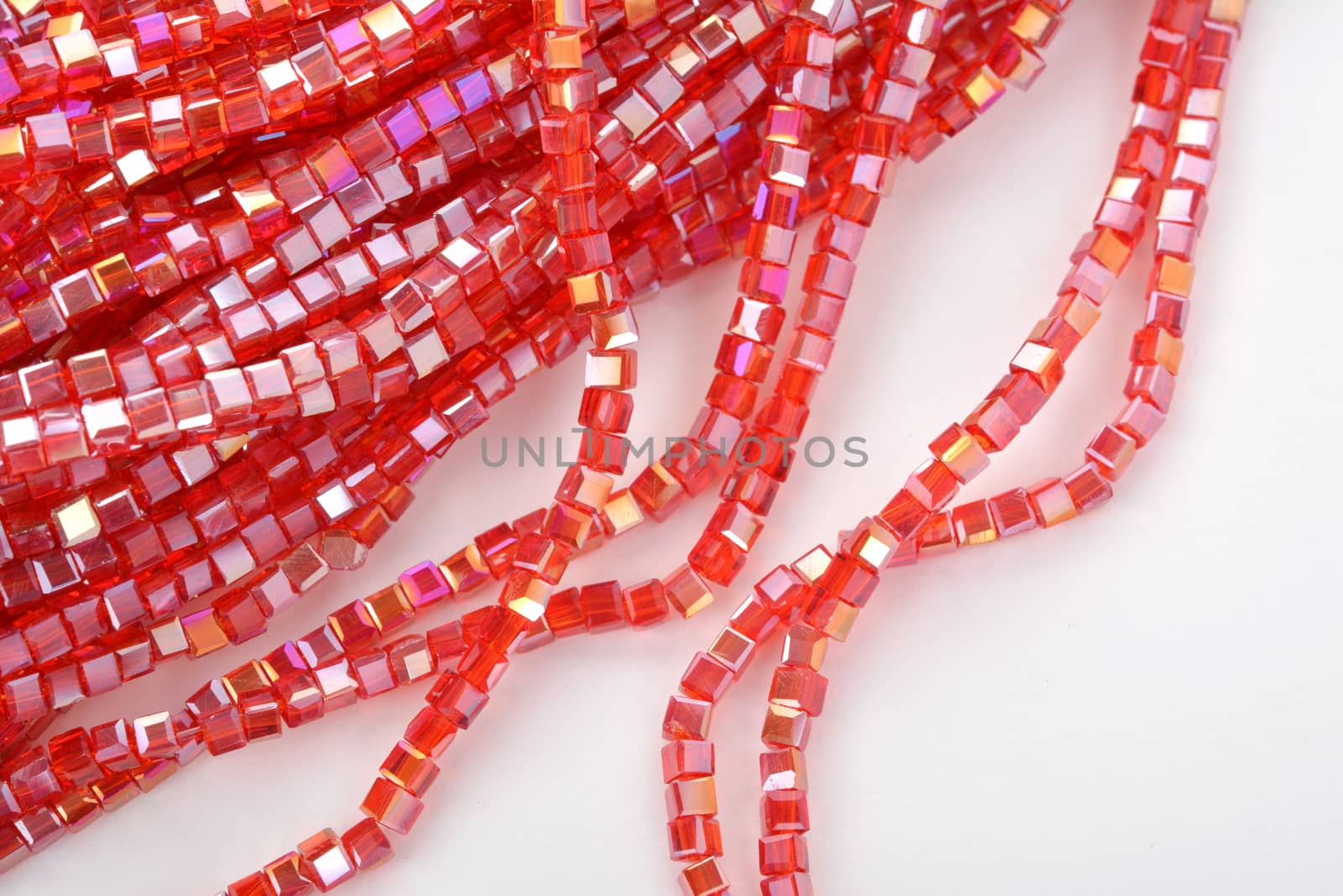 Beautiful Red Glass Sparkle Crystal Isoalted Beads on white background. Use for diy beaded jewelry