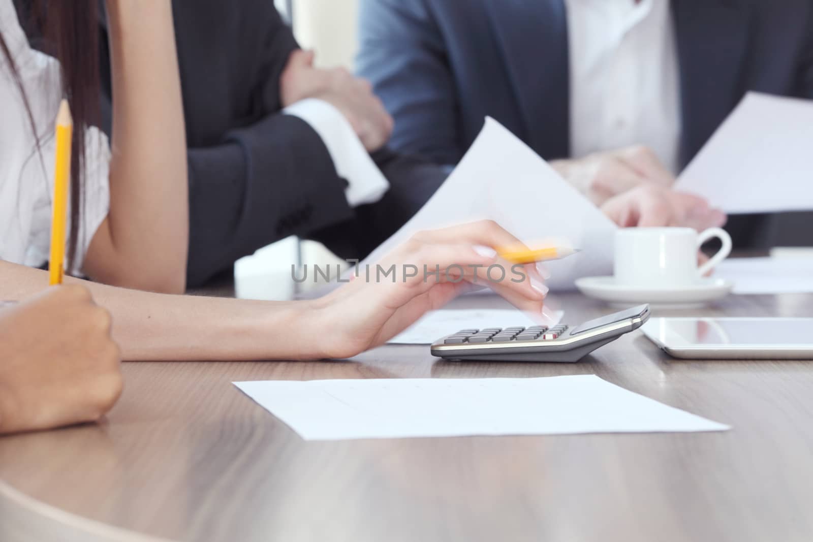 Close-up of business partners hands holding document papers , business meeting negotiation concept