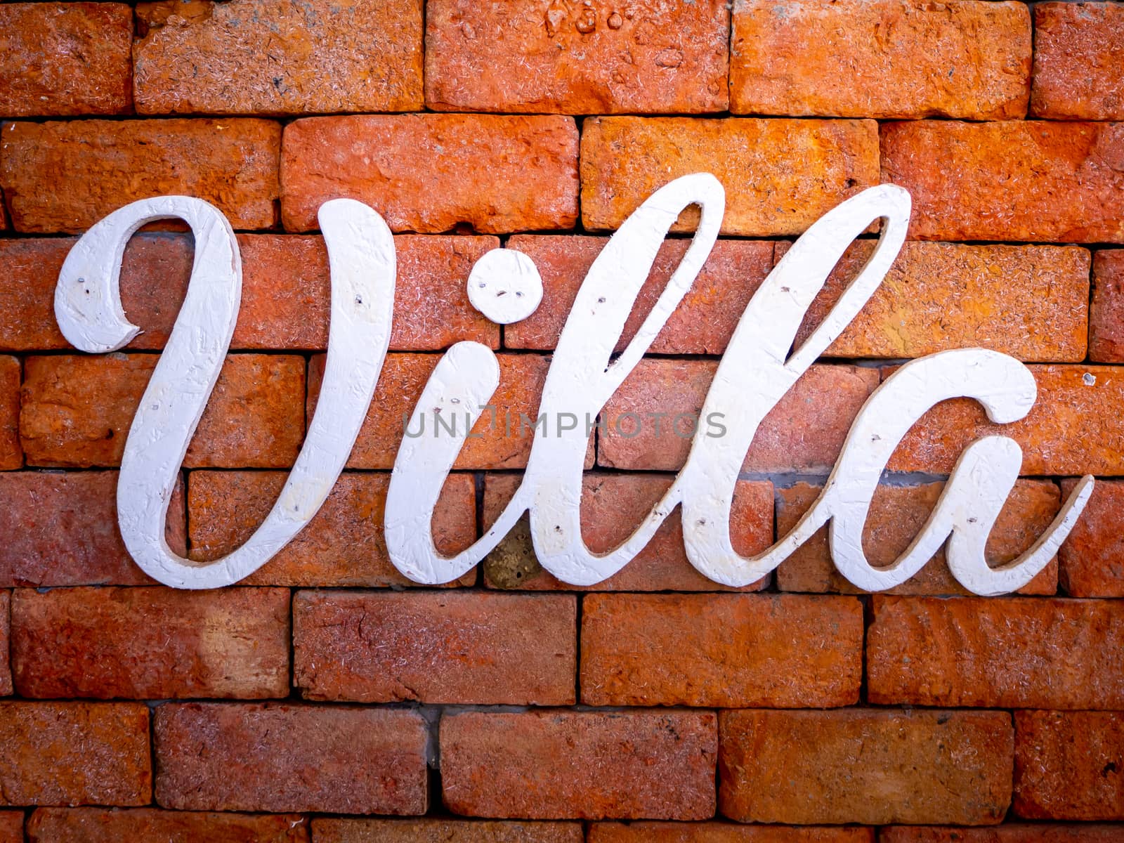 Villa on old red brick wall texture background by shutterbird