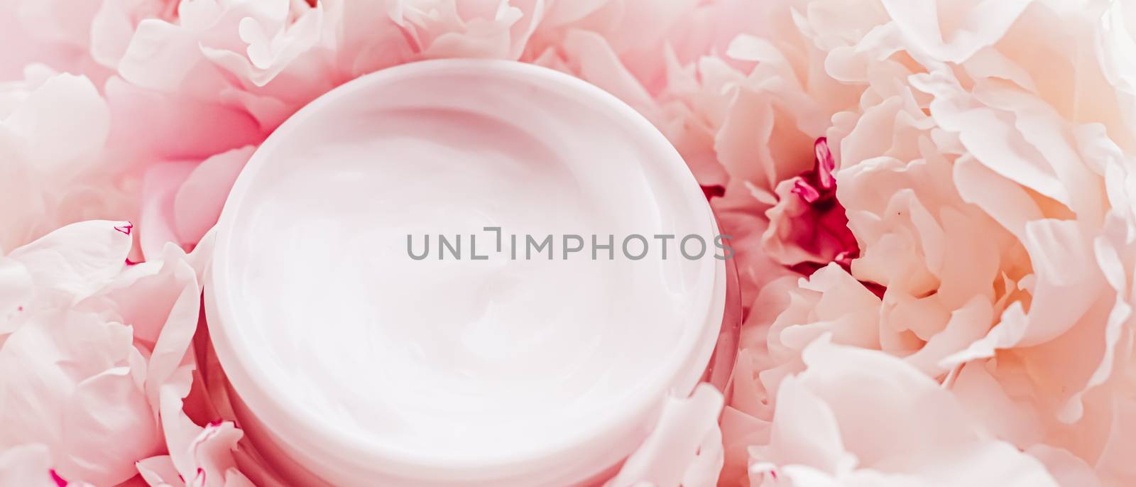 Luxe cosmetic cream jar as antiaging skincare routine product on background of peony flowers, body moisturizer and beauty branding by Anneleven
