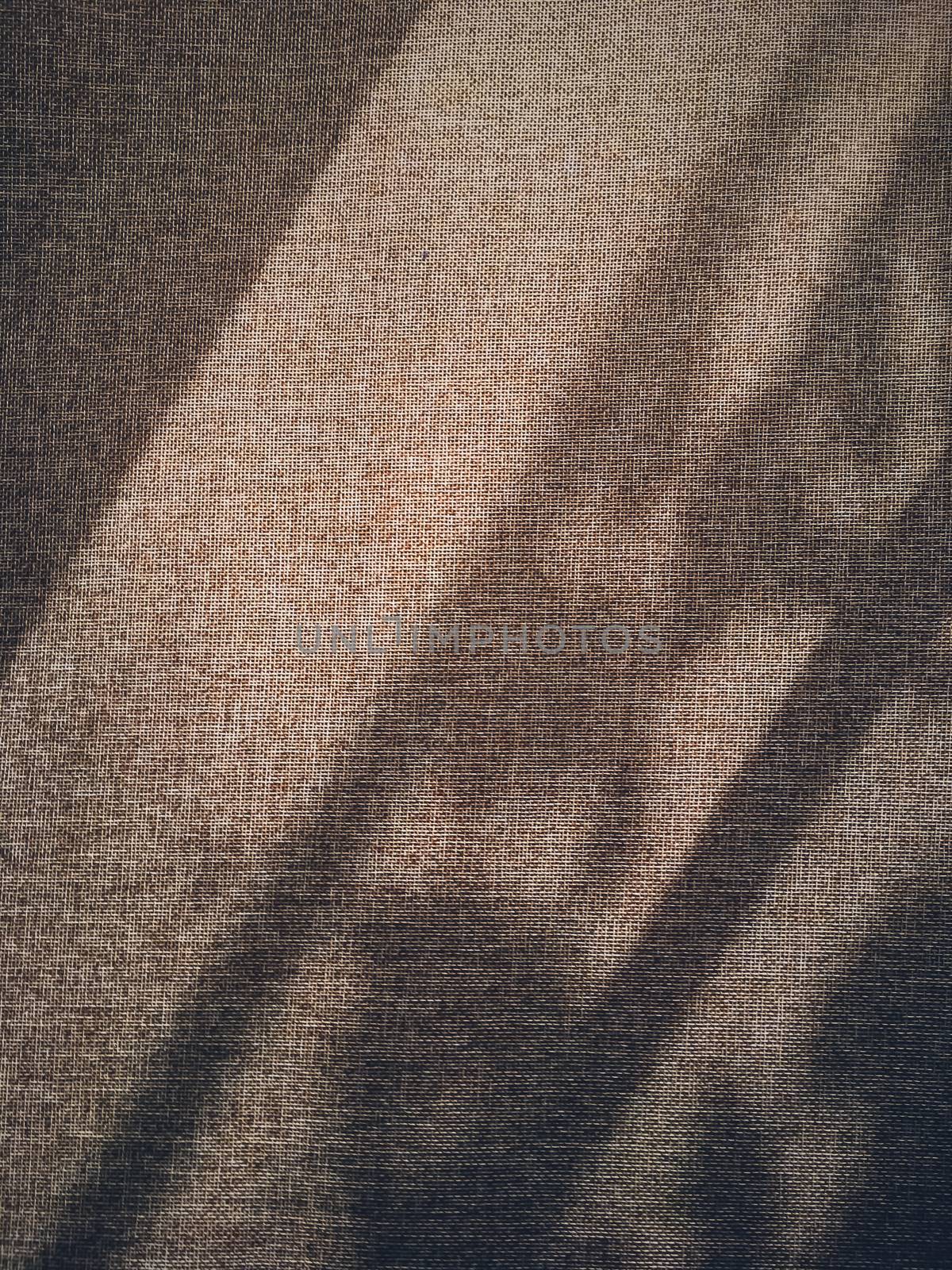 Linen texture and shadows as rustic background, fabric and material