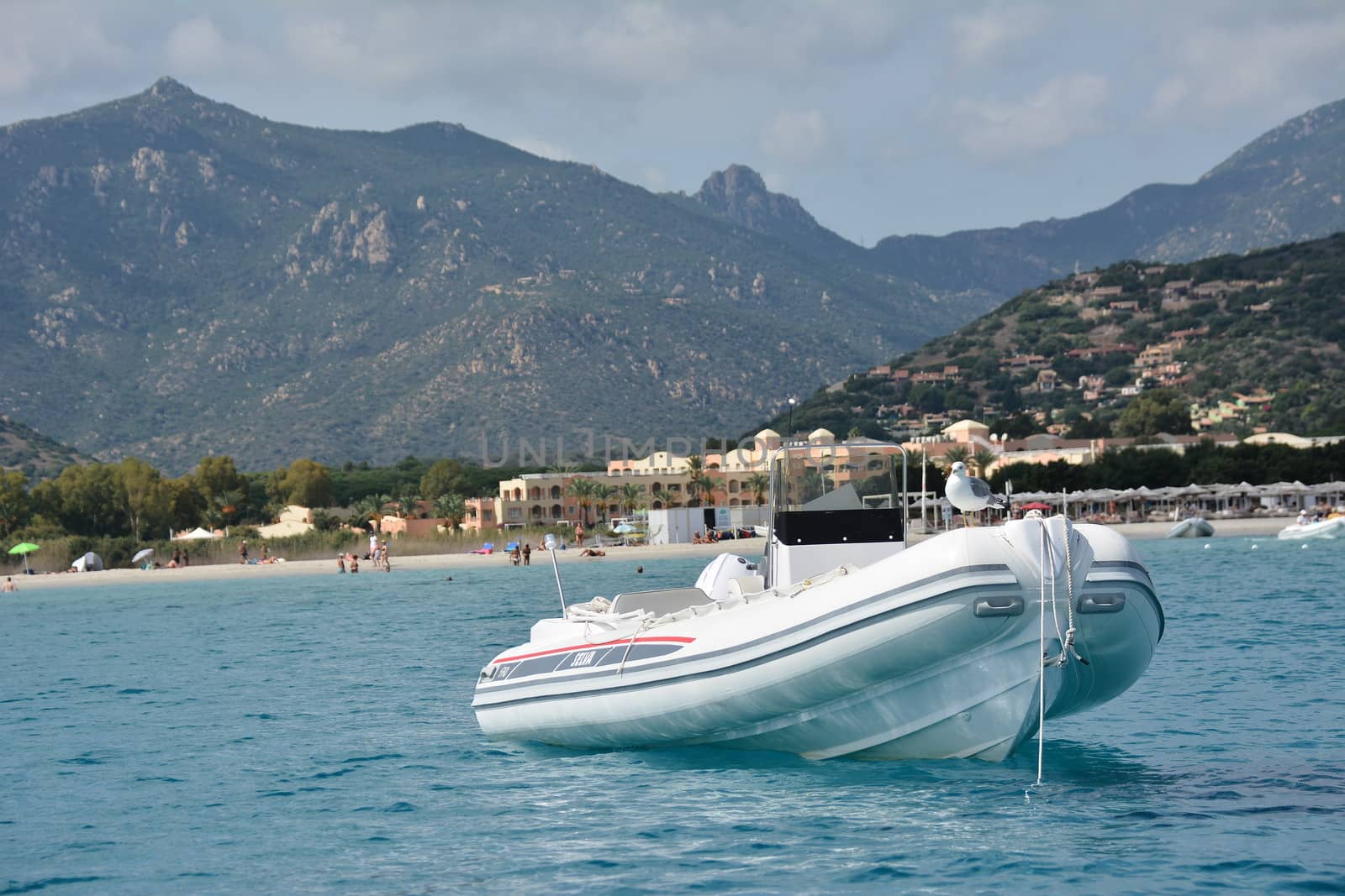 Motorboat in Villasimius near the beach in Sardinia, Italy