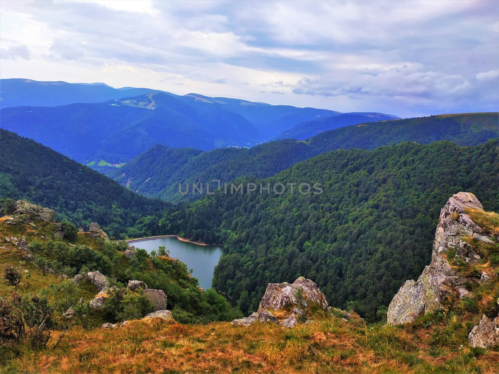 Lake Schiessrothried located in a valley between the hilly landscape of the Vosges by pisces2386