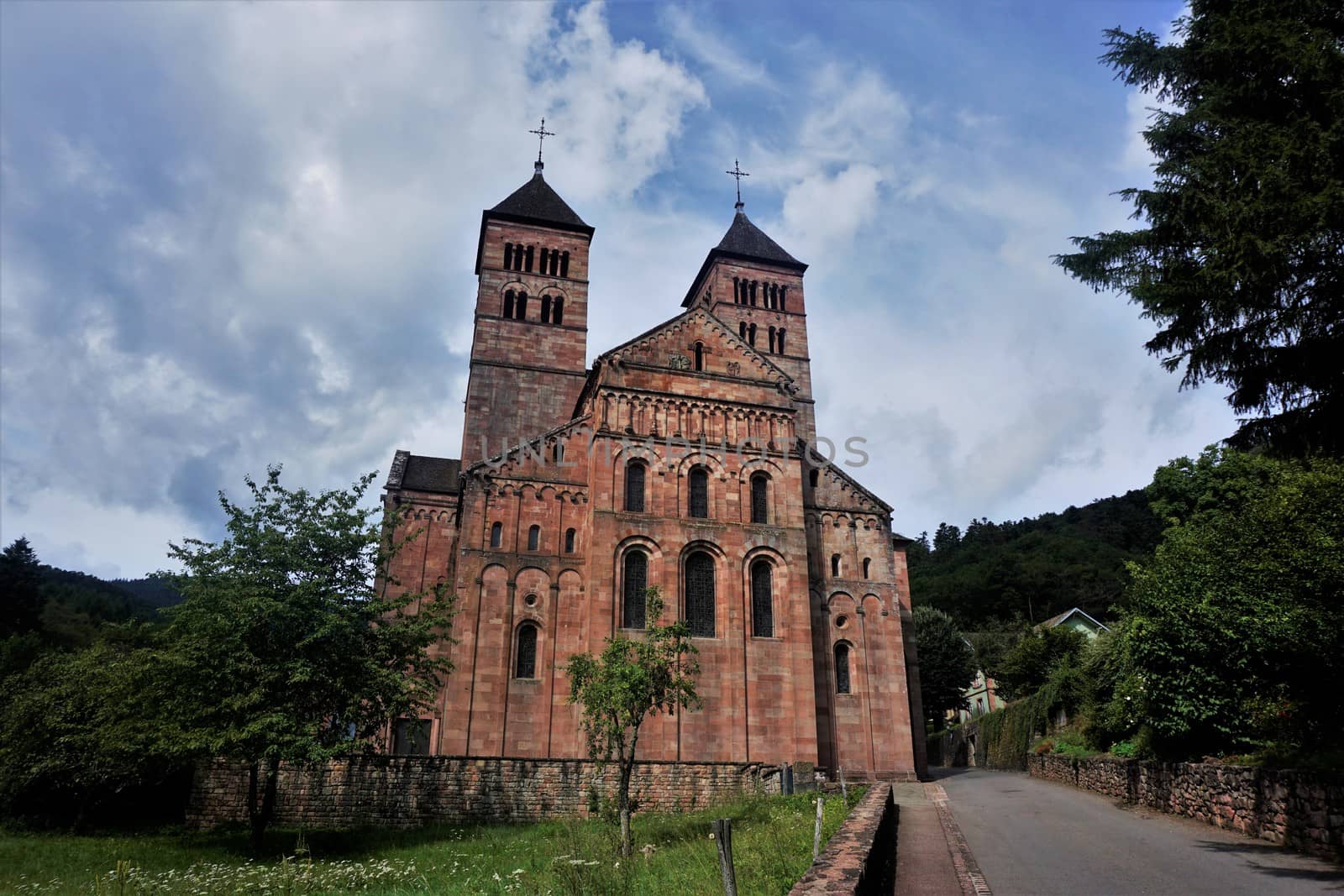 Footpath leading to the entrance of Murbach Abbey in the Vosges by pisces2386