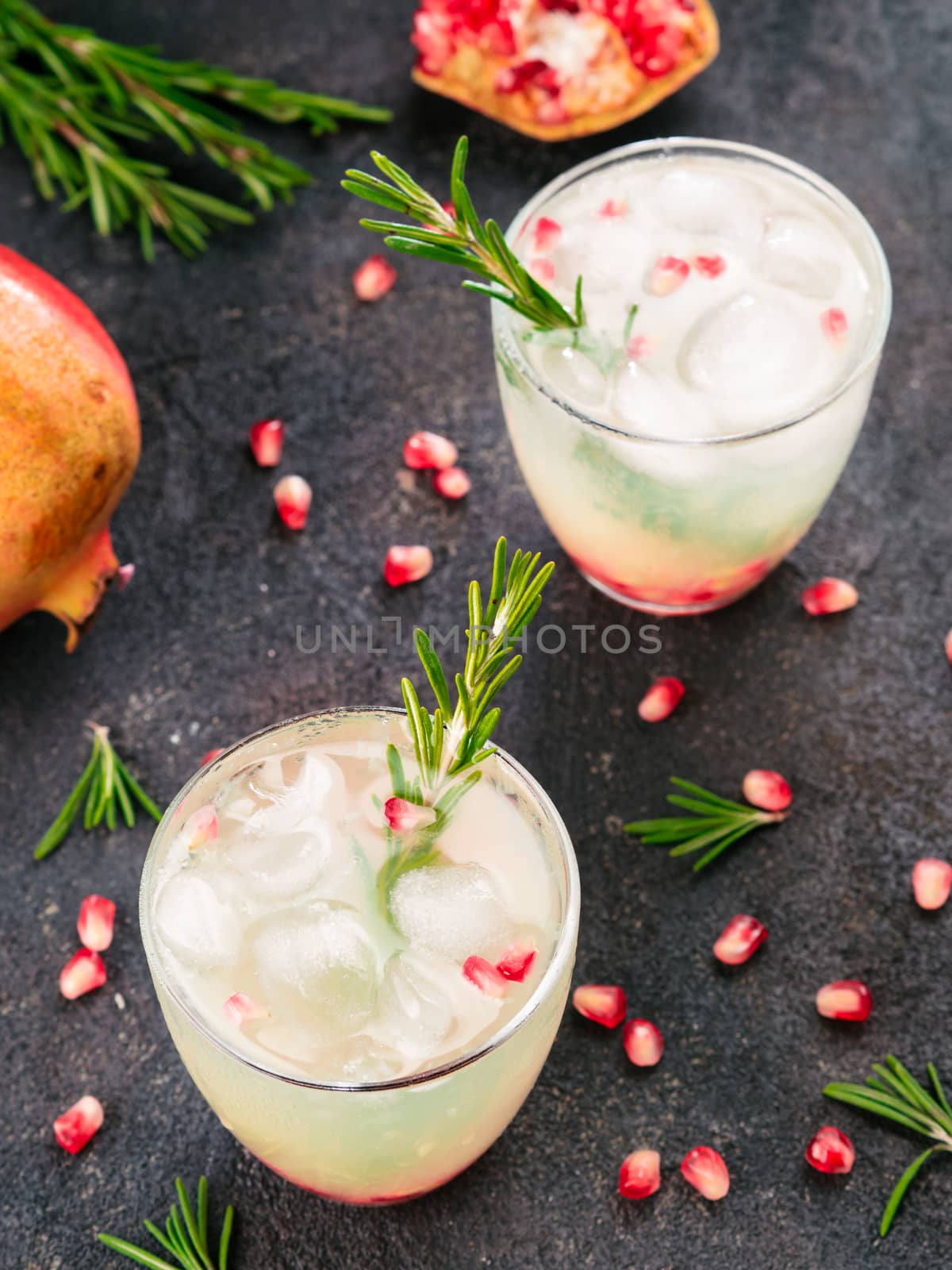 white sangria with rosemary, pomegrante and lemon juice by fascinadora