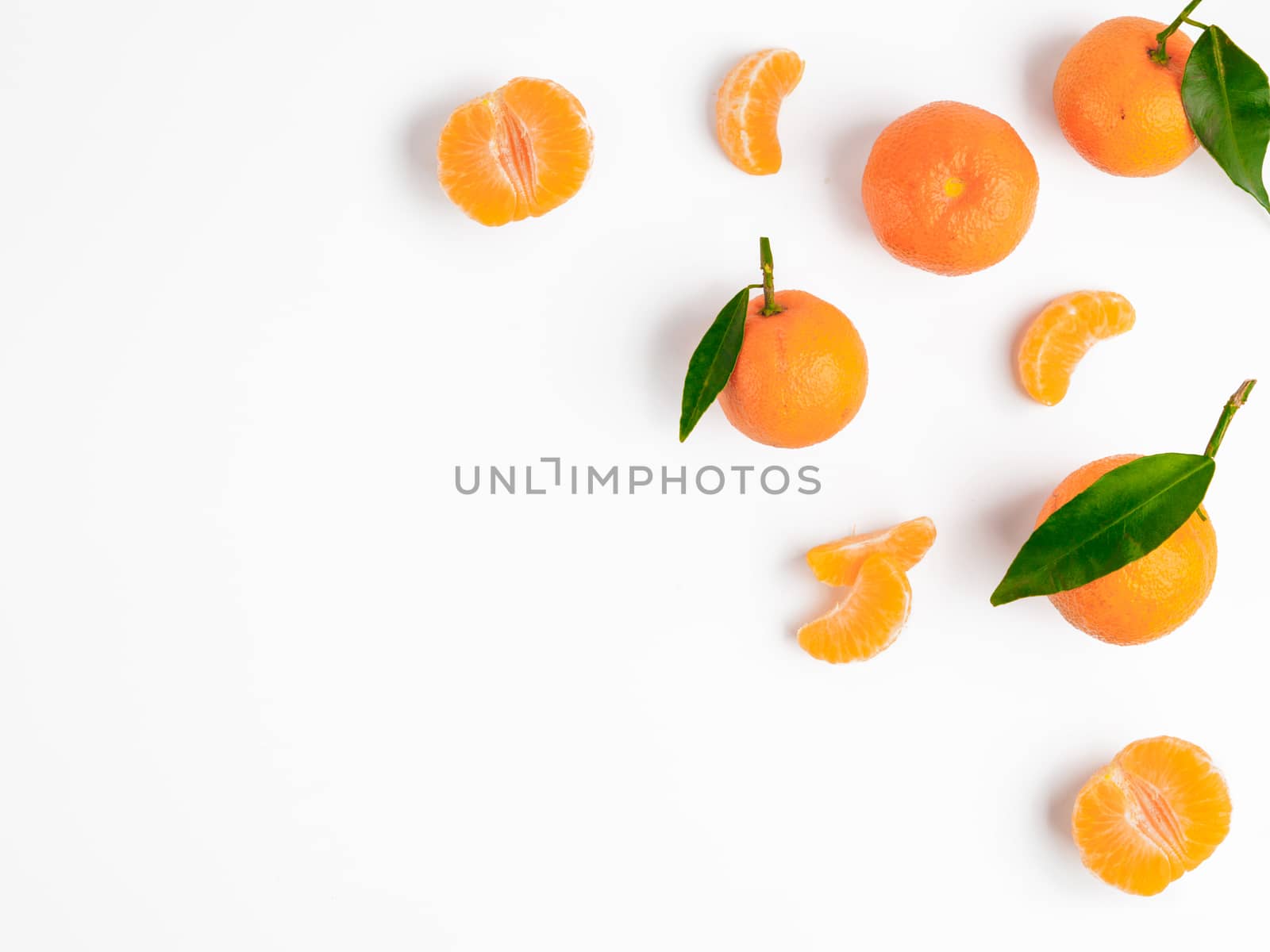 Christmas mandarin or tangerines pattern. Isolated on white with clipping path. Top view or flat-lay. Copy space.