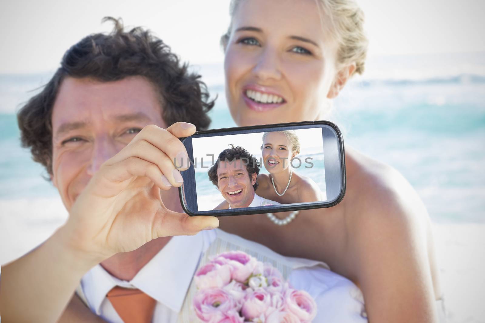 Composite of Couple taking selfie on smartphone