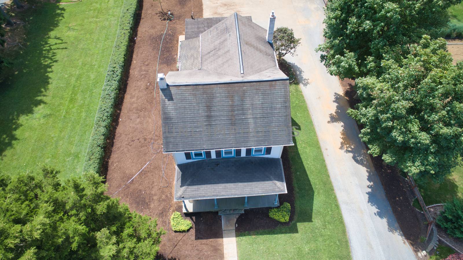 Aerial view of an Amish Farm House on a Summer Day