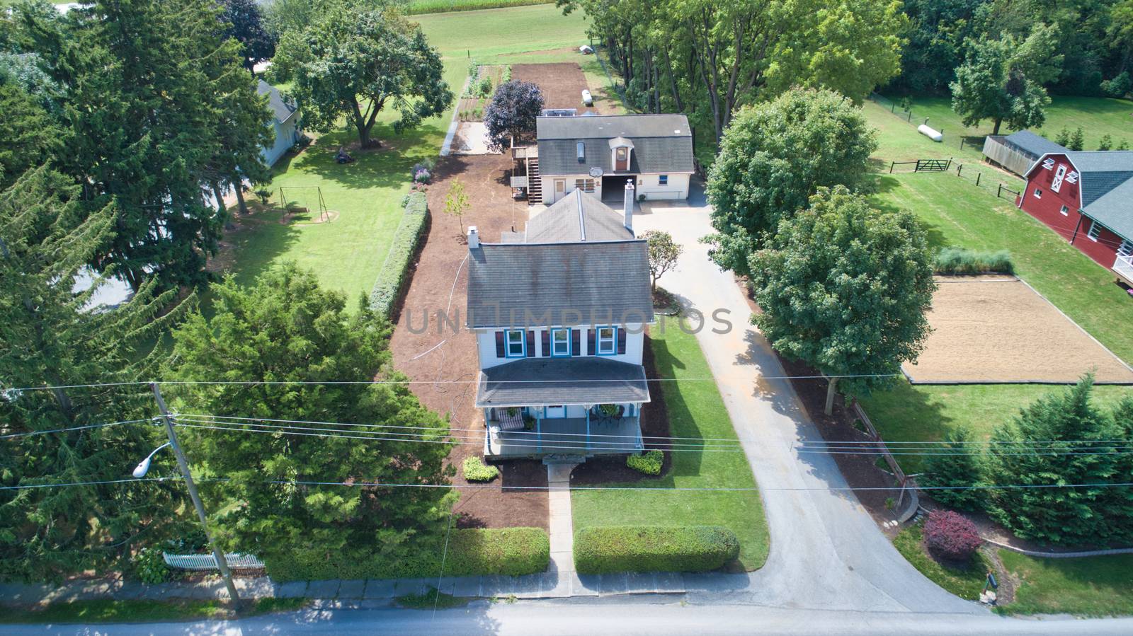 Aerial view of an Amish Farm House on a Summer Day