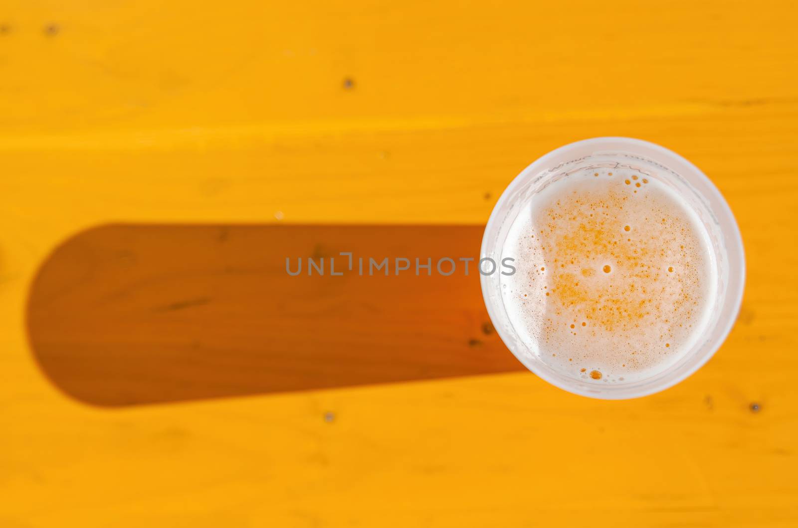 frozen beer on wooden board on summer afternoon by efeGePh