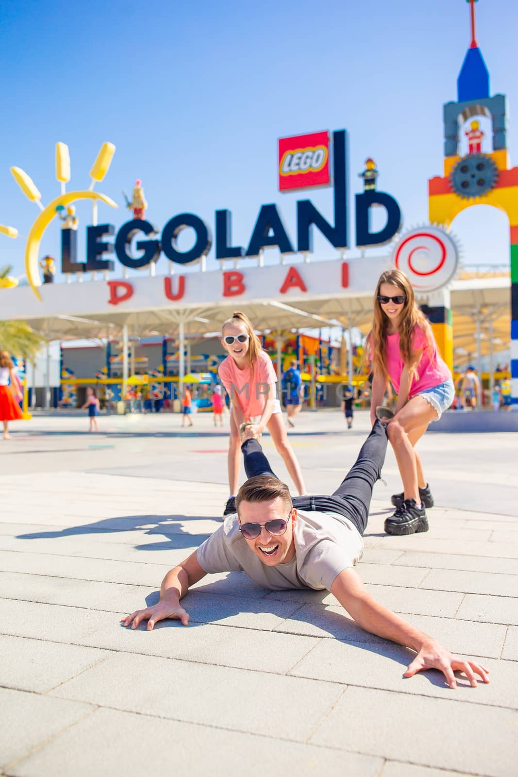 Family in Dubai Legoland at Dubai Parks and Resorts,Dubai, United Arab Emirates by travnikovstudio