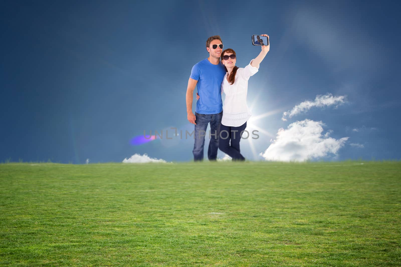 Composite image of couple using camera for picture by Wavebreakmedia