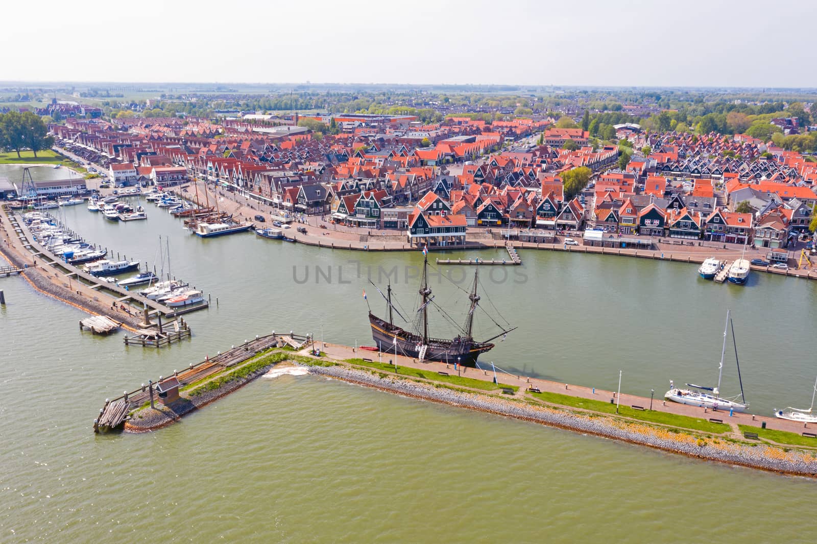 Aerial from the harbor and traditional village Volendam in the N by devy