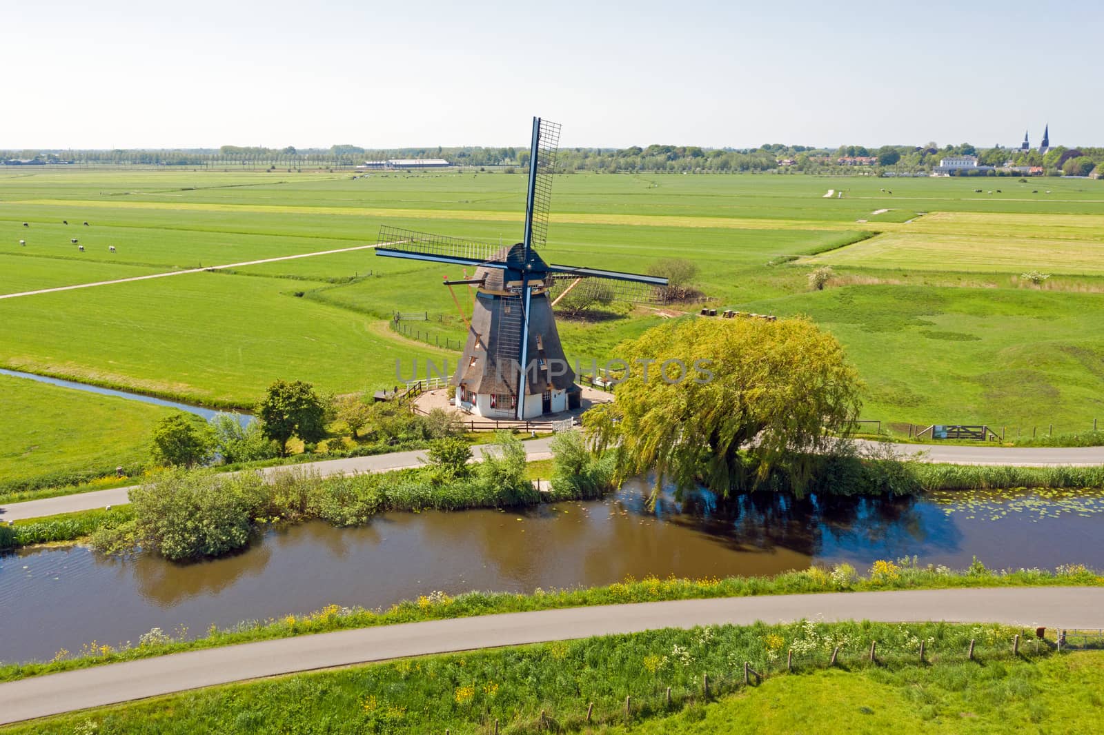 Oostzijdse Mill near Amsterdam in the countryside in the Netherl by devy
