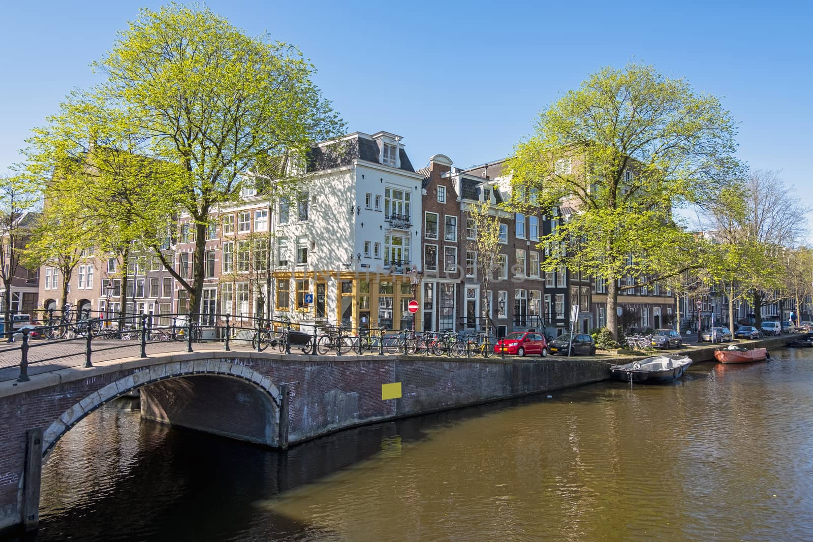 City scenic from Amsterdam at the canals in the Netherlands in spring