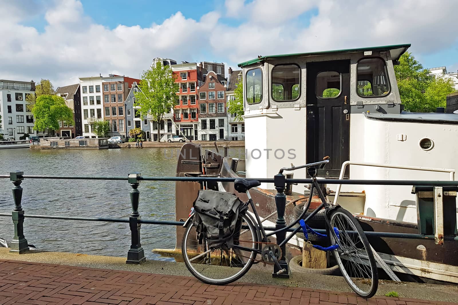 City scenic from Amsterdam at the river Amstel in the Netherlands