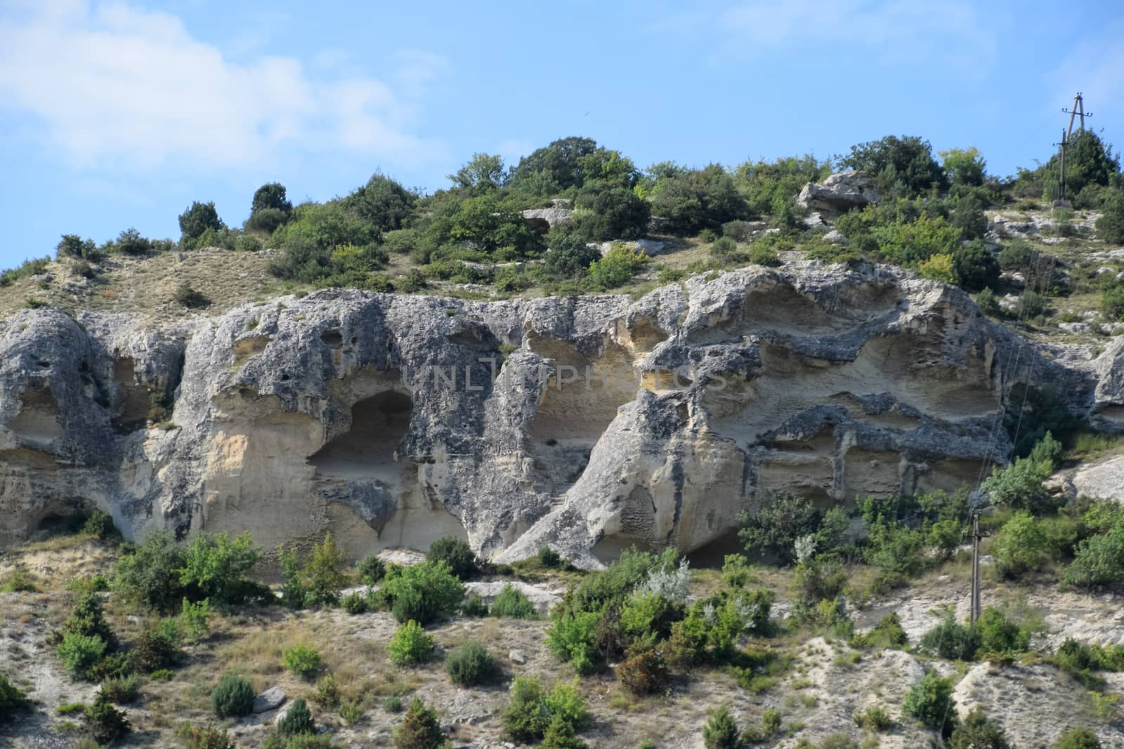 Limestone cliffs with sample of material, limestone erosion in the rocks. by fedoseevaolga