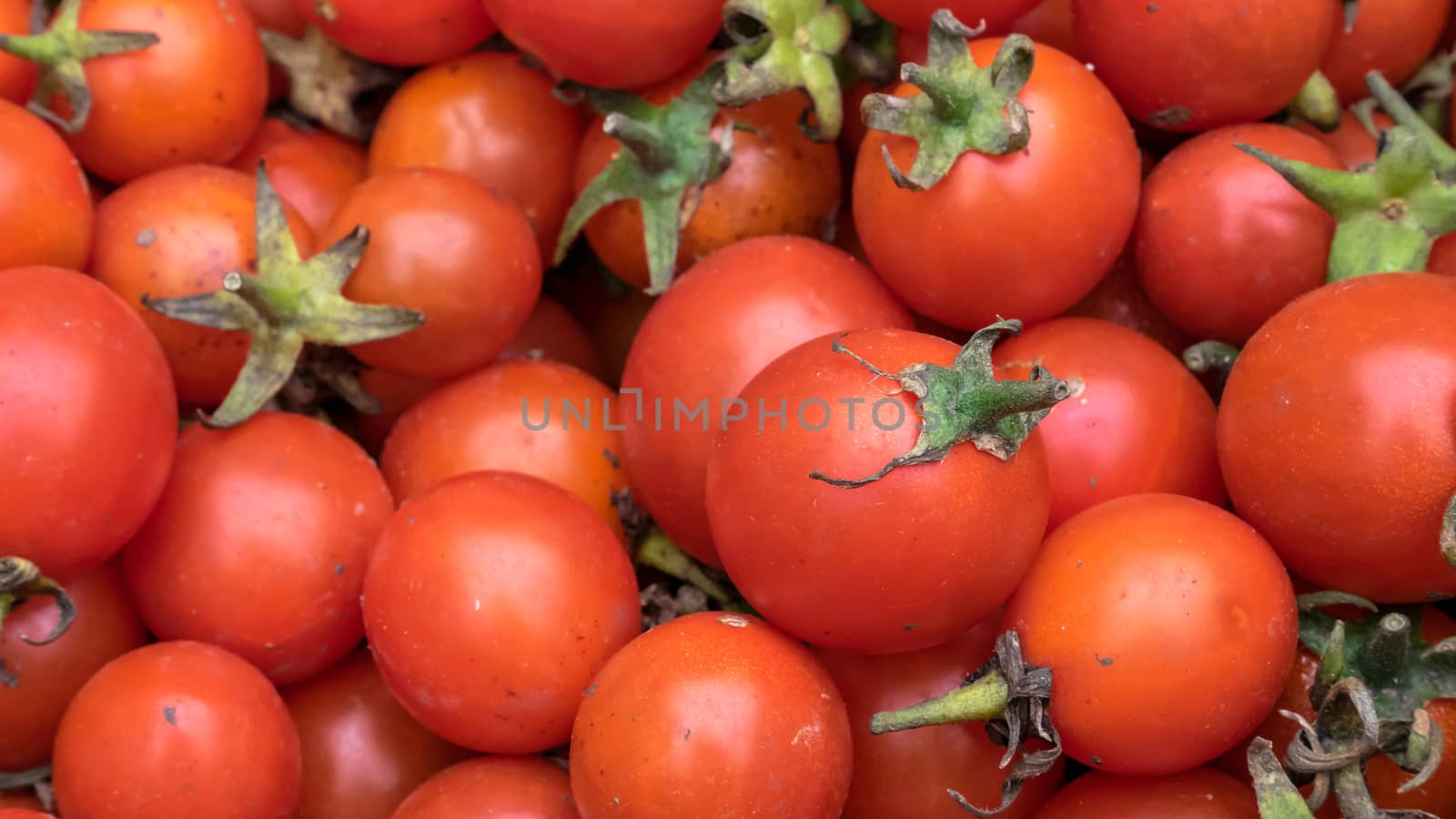 The close up of fresh tomatoes vegetable at street food market in Taipei, Taiwan.