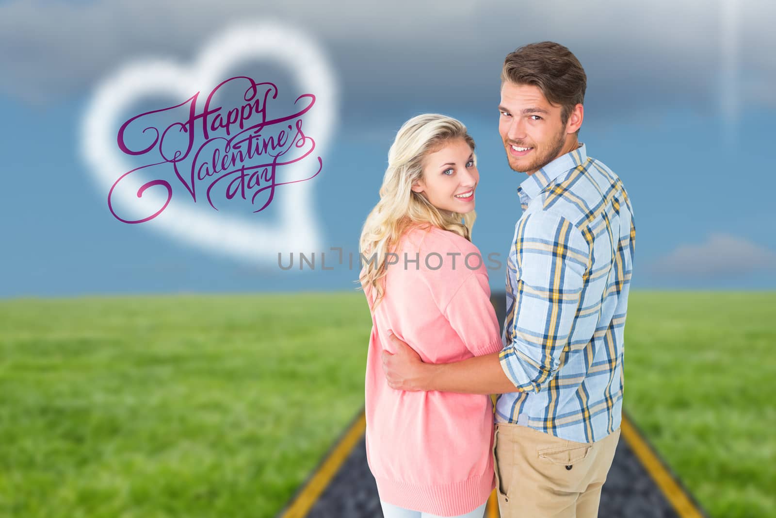 Composite image of attractive couple turning and smiling at camera by Wavebreakmedia