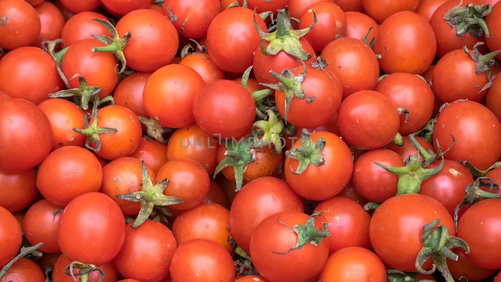 The close up of fresh tomatoes vegetable at street food market in Taipei, Taiwan.