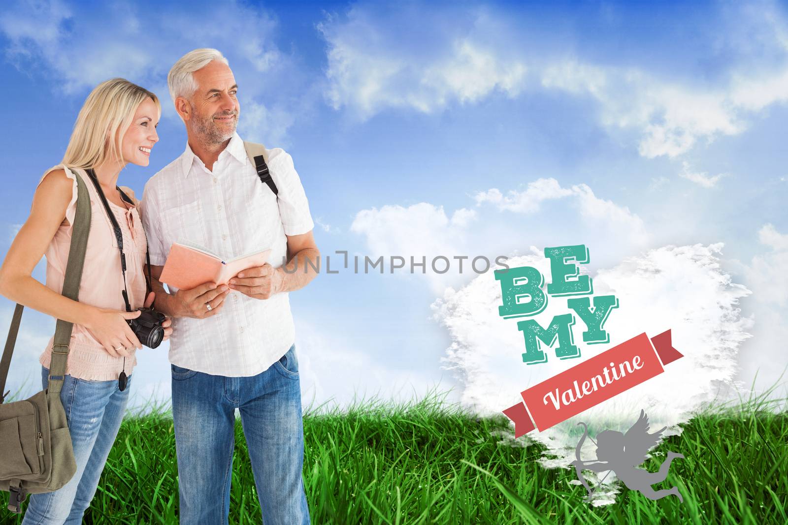 Happy tourist couple using the guidebook against cloud heart