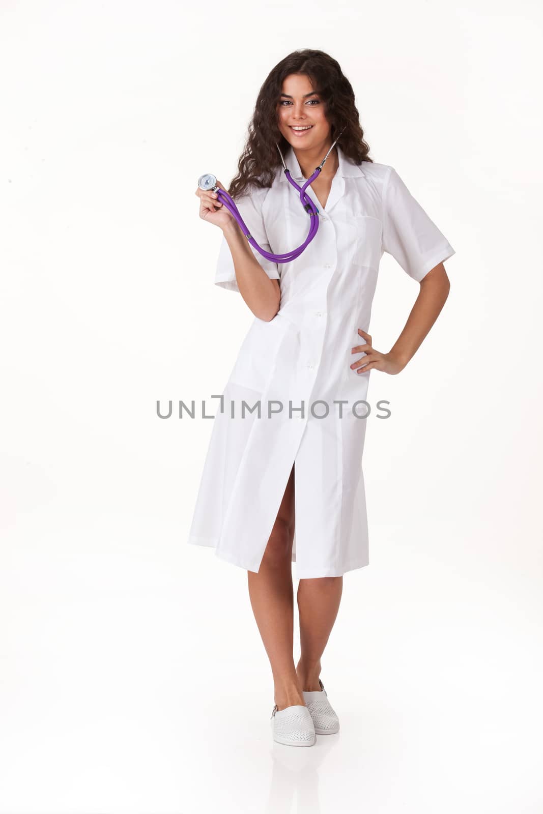 Young woman in the medical uniform on isolated background