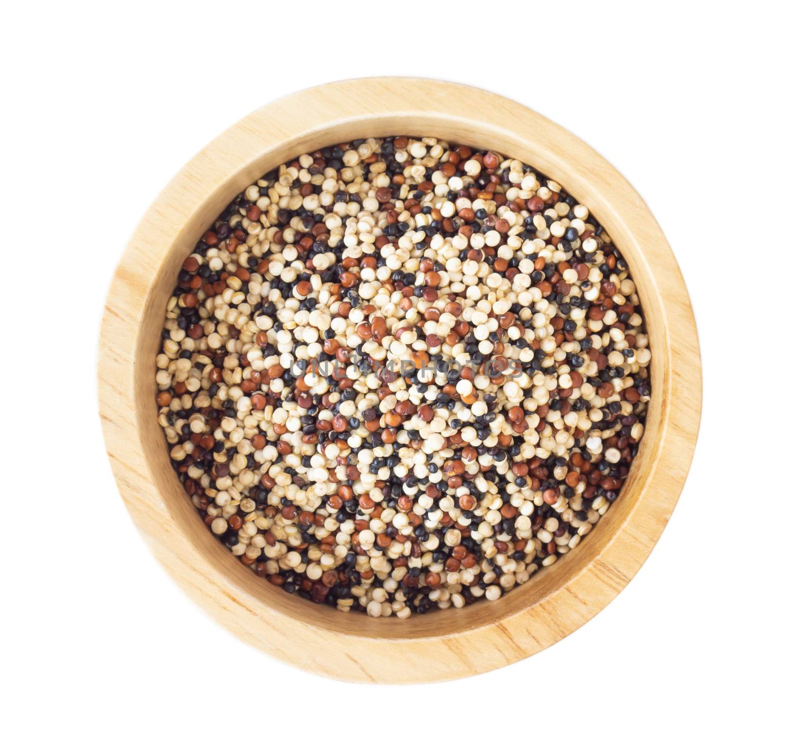 Quinoa in wooden bowl isolated on white background