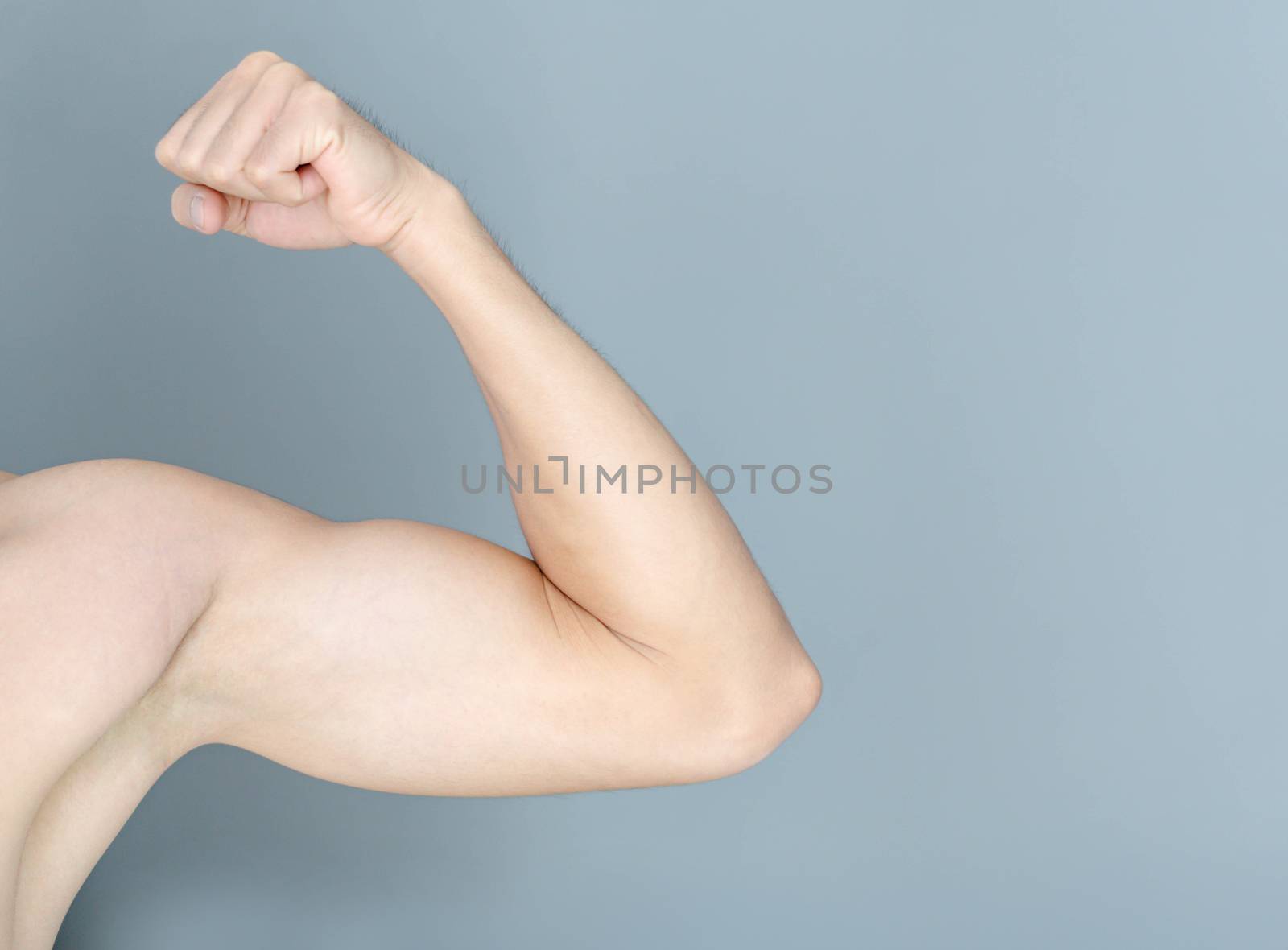 Back arm muscle man with grey background, health care and medical concept